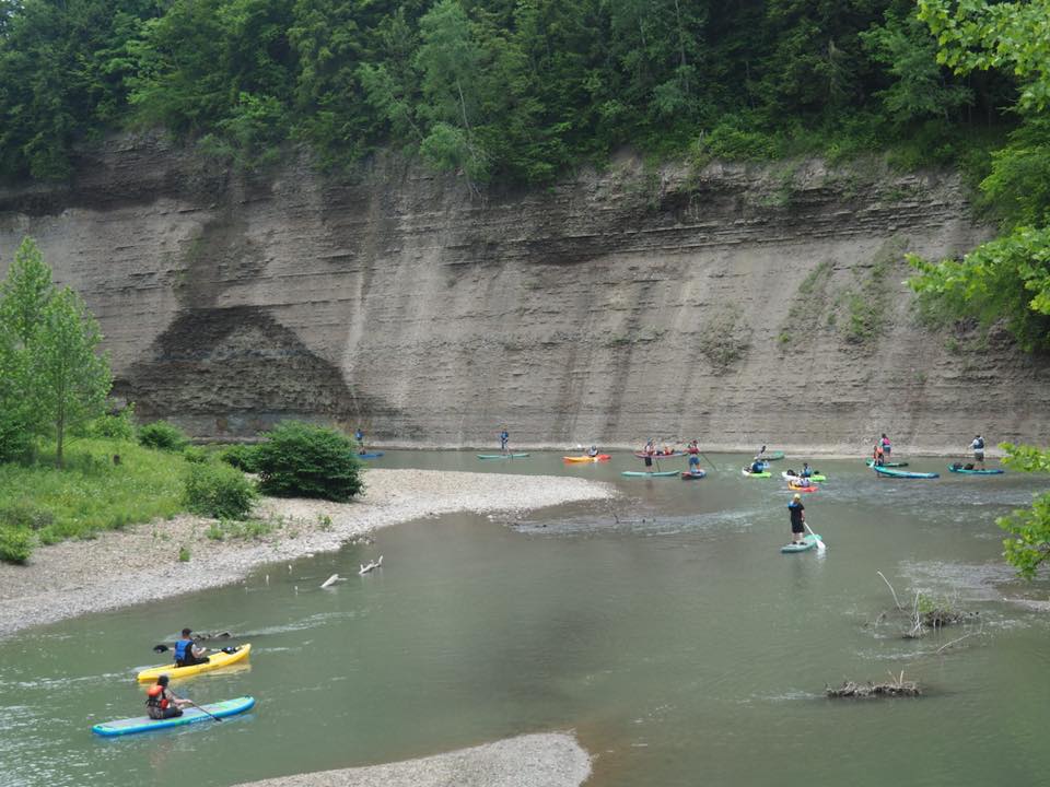 Kayakers below shale cliffs near Ellicottville
